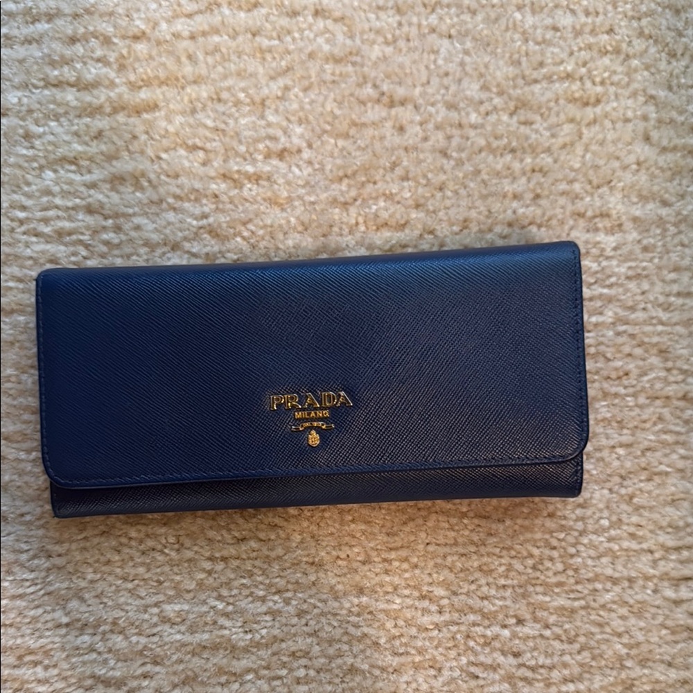 Prada Navy Leather Clutch/wallet with Gold Accents**gently used** COA and box